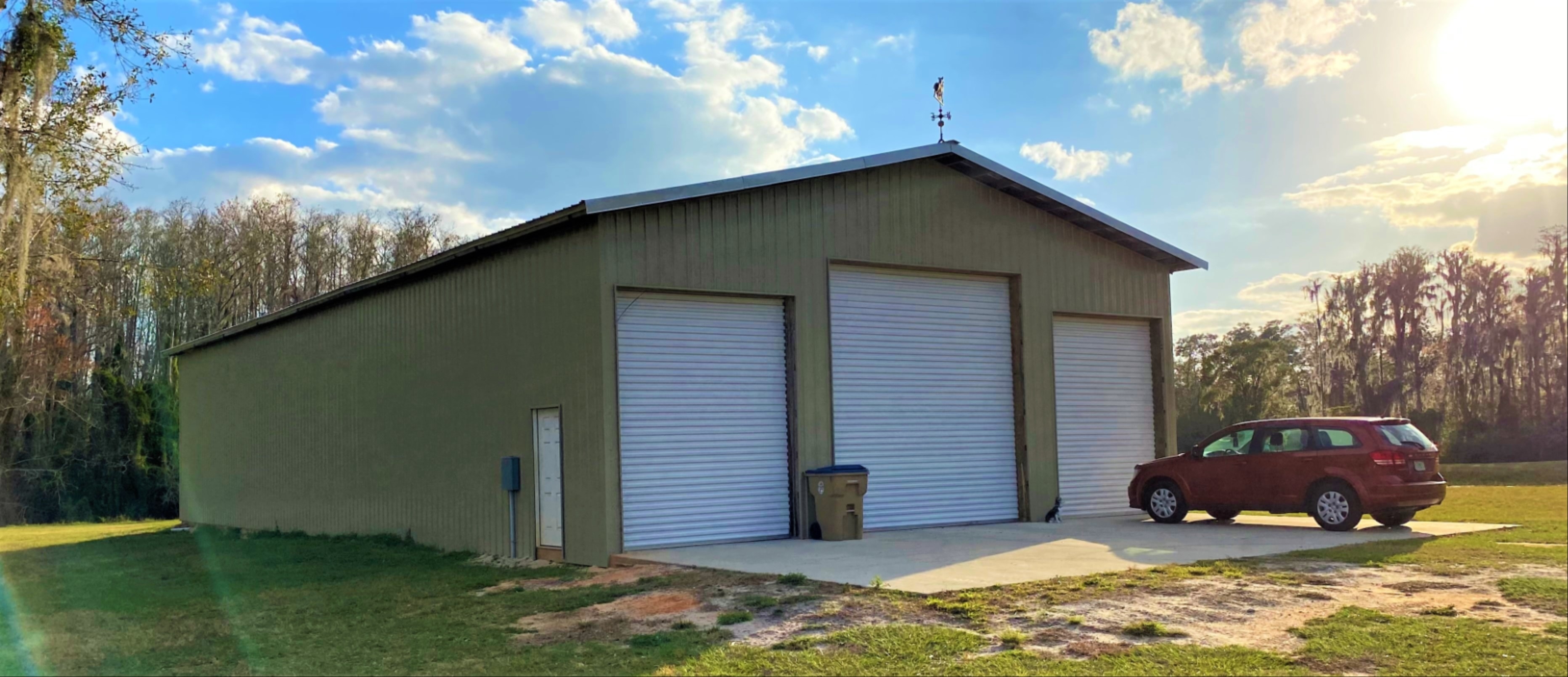 Large agricultural barn structure on rural Florida property